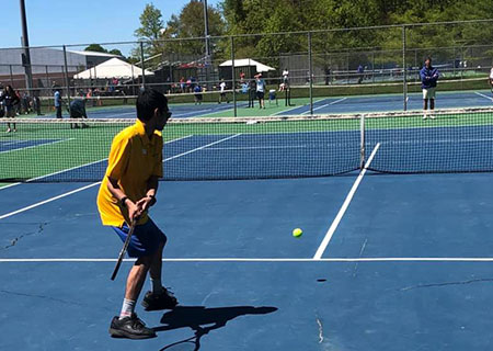 Young People Playing Tennis 
